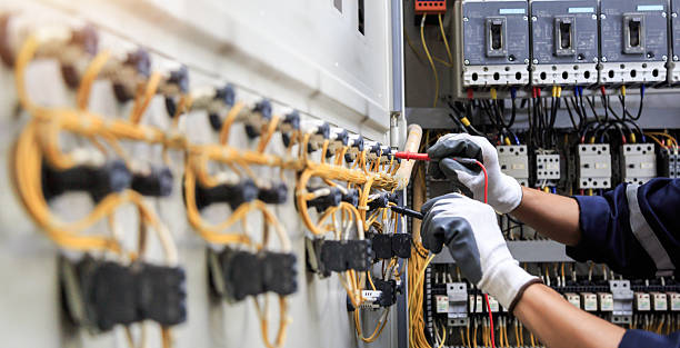 Professional Electrician technician working in Wellston, MO